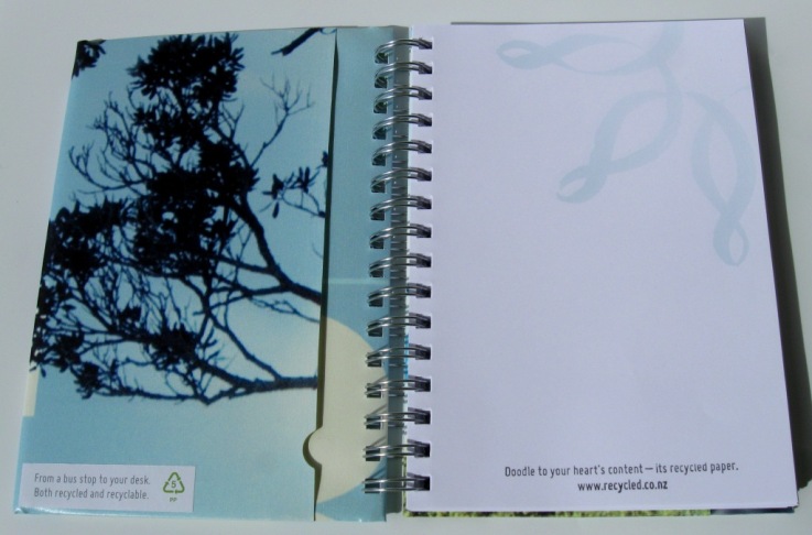 Inside view of a recycled Adshel poster notebook made for Meridian Energy that also re-used their dated letterhead paper by cutting it down to A5.